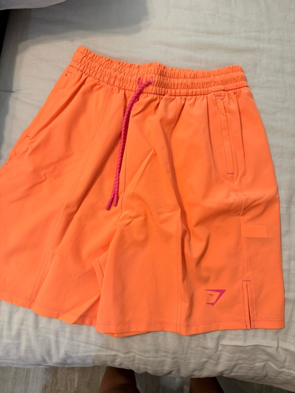 Gymshark Men’s Neon Orange Training Shorts with Pink Drawstring